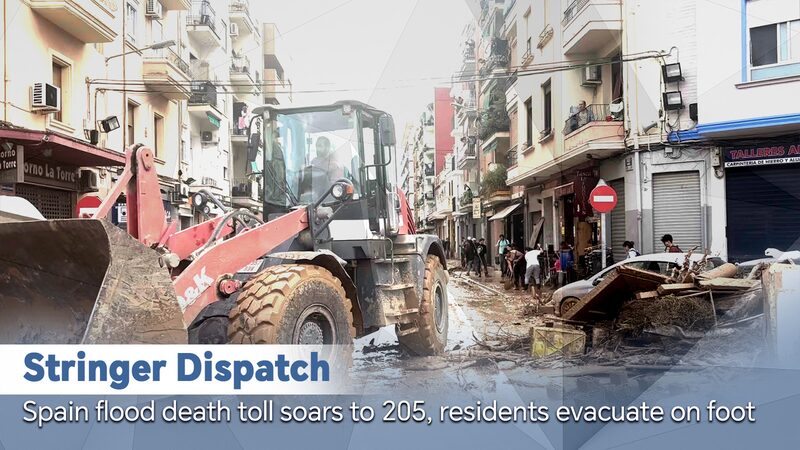 Spain’s Flood Death Toll Rises to 205 as Residents Flee on Foot Spain flood death toll soars to 205, residents evacuate on foot video poster