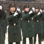 Gun Salutes As Remains of Cpv Heroes Buried in Ne China Video Poster 