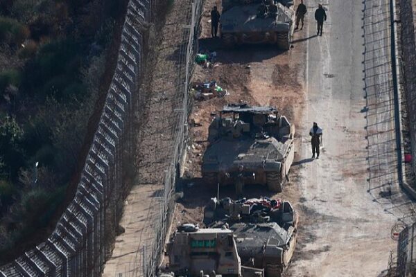 Israeli army controls border areas, strikes strategic weapons in Syria