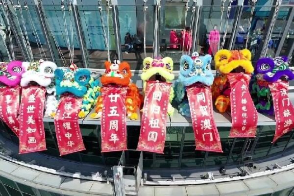 Lion dance soars at Macao Tower for 25th anniversary