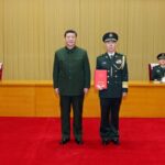 Xi Presents Order to Promote Military Officer to Rank of General 