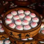 Red stamped Buns Bring Prosperity to Jinhuas New Year Tables 
