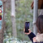 ne Zha 2 Themed Tree Paintings Wow Visitors at Park in China 