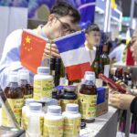 China France Pledge to Resolve Economic Disputes Through Dialogue 