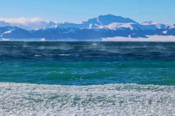 Magical Melt: Sayram Lake’s Stunning Transition into Spring Nature's Symphony: Sayram Lake foreshadows spring's ice-melting season