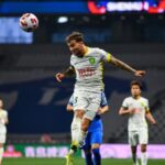 Ten man Beijing Guoan Hold Shanghai Shenhua 2 2 on Road 