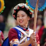 Tourists Enjoy Immersive Experience of Ethnic Culture in Kunming 
