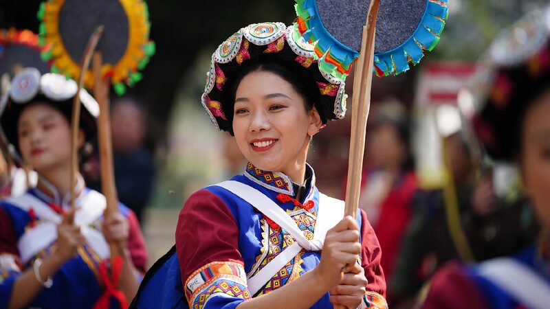 Tourists Enjoy Immersive Experience of Ethnic Culture in Kunming 