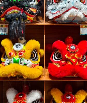 Vibrant Lion Heads Celebrate Legends in Guangdong’s Traditional Lion Dance Colorful lion heads in traditional lion dance video poster