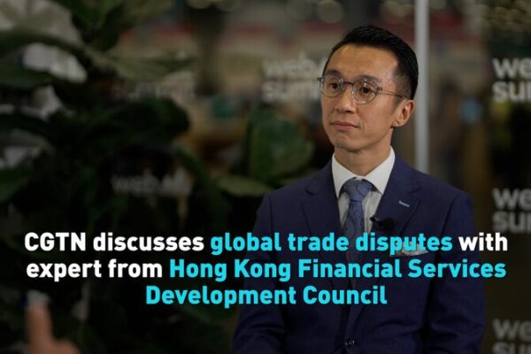 CGTN discusses global trade disputes with financial expert video poster