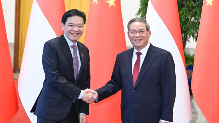 China and Singapore Vow Closer Ties in High-Level Beijing Meeting China, Singapore pledge close exchange and cooperation