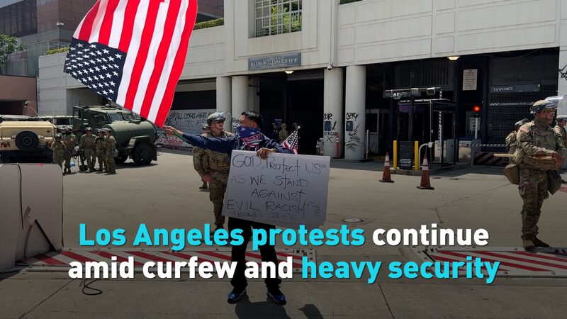 Los Angeles Protests Continue Amid Curfew and Heavy Security Los Angeles protests continue amid curfew and heavy security video poster