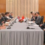 Chinese Fm Meets British Counterpart to Discuss Ties