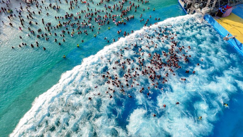 Zhengzhou Locals Flock to Water Park to Beat the Heat Zhengzhou pool offers crowd summer relief